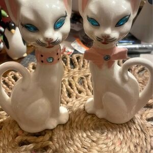 Elegant White Ceramic Cat Figurines with Pink and Blue Accents